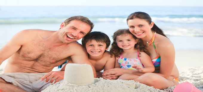 happy holiday family on beach.jpg